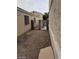 Gravel backyard with a gate and small yard at 3254 Gold Run St, North Las Vegas, NV 89032