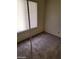 Carpeted bedroom with window and closet at 45 Logan Ct, Las Vegas, NV 89110