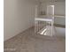 Upstairs hallway offering access to bedrooms and bath at 4760 Woodridge Rd, Las Vegas, NV 89121