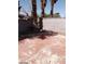 Small backyard with block wall and patio at 5175 Palmyra Ave, Las Vegas, NV 89146