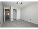 Bedroom with carpet, ceiling fan and mirrored closet doors at 6045 Crystal Talon St, Las Vegas, NV 89130