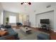 Bright living room with hardwood floors, comfy seating, and modern coffee table at 6045 Crystal Talon St, Las Vegas, NV 89130