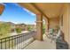 Relaxing balcony with outdoor furniture and city views at 7689 Monomoy Bay Ave, Las Vegas, NV 89179