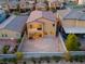 Aerial view of the backyard with a balcony and dirt ground at 6877 Painted Morning Ave, Las Vegas, NV 89142