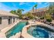 Stunning pool and spa with patio furniture and mountain views at 11220 Romette Ct, Las Vegas, NV 89141