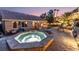 Relaxing pool and spa area with patio seating at 11220 Romette Ct, Las Vegas, NV 89141