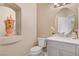 Powder room with vanity and toilet at 4156 Balmoral Castle Ct, Las Vegas, NV 89141