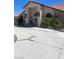 Single-story home with a large front yard and driveway at 6687 Atwood Ave, Las Vegas, NV 89108