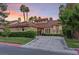 Luxury home exterior with tile roof and landscaped yard at 8199 Pinnacle Peak Ave, Las Vegas, NV 89113