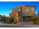 Two-story modern home with a neutral color scheme and attached garage at 2150 Maderno St, Henderson, NV 89044