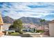 Aerial view of houses with mountain backdrop at 6611 Caddington Ave, Las Vegas, NV 89110