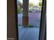 View of backyard through sliding glass door at 3656 Bella Legato Ave, North Las Vegas, NV 89081