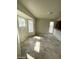 Dining area with tile floors and large windows at 1745 Starridge Way, Las Vegas, NV 89142