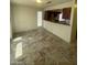 Bright dining area with tile flooring and kitchen access at 1745 Starridge Way, Las Vegas, NV 89142