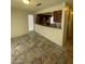 Bright dining area with tile flooring and kitchen access at 1745 Starridge Way, Las Vegas, NV 89142