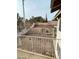 Backyard view from a balcony, showing a stone path and landscaping at 2813 Cacto Ct, Henderson, NV 89074