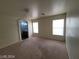 Bright bedroom with two windows and neutral wall tones at 2711 Morning Break Ct, Las Vegas, NV 89142