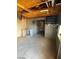 Unfinished basement area with concrete floors and exposed beams at 39 E Pacific Ave, Henderson, NV 89015