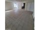 Spacious living area with tile flooring and lots of natural light at 1710 Shadow Mountain Pl, Las Vegas, NV 89108