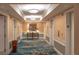 Elegant hallway with elevators and plush carpeting at 145 E Harmon Ave # 1120, Las Vegas, NV 89109