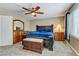 Spacious Primary bedroom with king bed and ceiling fan at 679 Fontayne Ave, Las Vegas, NV 89123