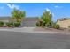 One-story house with attached garage and well-maintained landscaping at 10024 Bundella Dr, Las Vegas, NV 89134