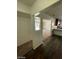 View of the entryway with wood-look flooring and a view into the living area at 3955 Ventura Way, Las Vegas, NV 89121