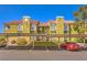 Green two-story building with parking and landscaping at 7950 W Flamingo Rd # 1086, Las Vegas, NV 89147