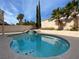 Stunning kidney shaped pool with a rock waterfall feature at 9312 Angelfish Dr, Las Vegas, NV 89117