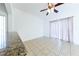 Dining area with tile floors, granite counter, and ceiling fan at 2847 Cattail Cove St, Laughlin, NV 89029