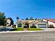 Charming single-story home with well-manicured lawn at 9509 Bottle Creek Ln, Las Vegas, NV 89117