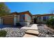 Single story home with two car garage and landscaped front yard at 2881 Thunder Bay Ave, Henderson, NV 89052