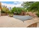 Covered pool area with surrounding landscaping at 8225 Romantic Sunset St, Las Vegas, NV 89131