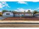 Ranch style home with a well-manicured front yard at 2100 Las Flores St, Las Vegas, NV 89102