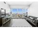 Living room with city views and a leather sofa at 4471 Dean Martin Dr # 1502, Las Vegas, NV 89103