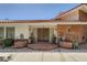 Brick house entrance with double doors, lion statues, and a brick walkway at 7082 Mira Vista St, Las Vegas, NV 89120