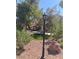 Pathway with benches and lamp post, leading to the house at 7082 Mira Vista St, Las Vegas, NV 89120