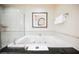 Relaxing jacuzzi tub with modern fixtures at 125 E Harmon Ave # 2401&2403, Las Vegas, NV 89109