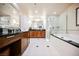 Elegant bathroom with double vanity and soaking tub at 125 E Harmon Ave # 2401&2403, Las Vegas, NV 89109