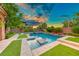 Resort-style pool and spa with artificial turf at 2352 Martinique Ave, Henderson, NV 89044