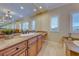 Bathroom with double vanity, large mirror, and plantation shutters at 2352 Martinique Ave, Henderson, NV 89044