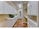 Bright laundry room featuring ample cabinetry and storage at 2352 Martinique Ave, Henderson, NV 89044