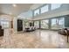 Spacious dining room with high ceilings and large windows at 5337 Polizze Ave, Las Vegas, NV 89141