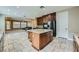 Gourmet kitchen featuring granite counters and stainless steel appliances at 5337 Polizze Ave, Las Vegas, NV 89141