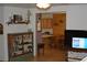 Living room with hardwood floors and built-in shelving at 1382 N Trout Canyon Rd, Las Vegas, NV 89124