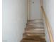 Simple wooden stairs leading to the second floor at 1382 N Trout Canyon Rd, Las Vegas, NV 89124