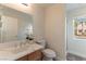 Clean bathroom with a large vanity and shower at 8888 Catfish Stream Ave, Las Vegas, NV 89178