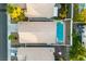 An aerial view showcasing a house with a private pool in a residential area at 211 Sandpiper Village Way, Henderson, NV 89012