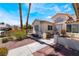 House exterior with well-maintained landscaping and walkway at 6356 Canyon Ridge Dr, Las Vegas, NV 89108