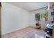 Simple bedroom with tiled floor and a guitar at 6356 Canyon Ridge Dr, Las Vegas, NV 89108